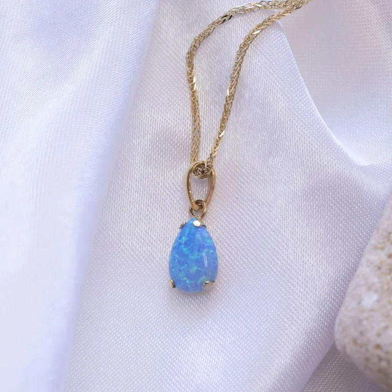 14K Yellow Gold Teardrop Blue Opal 7X10mm Pendant